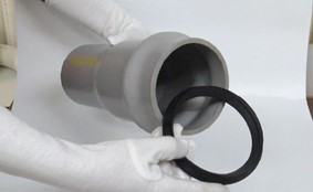 Inserting uPVC pipe into fitting socket for alignment before adding rubber ring in agriculture piping